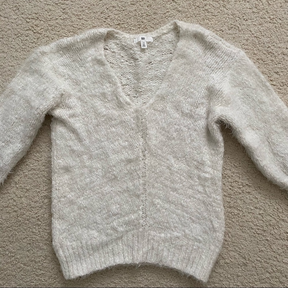 White fuzzy sweater